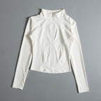 White long-sleeve athletic top on a background